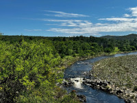 EN VENTA LOTE CON COSTA DE RÍO EN POTRERO DE GARAY