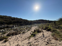 LOTE CON COSTA DE RIO EN  POTRERO DE GARAY